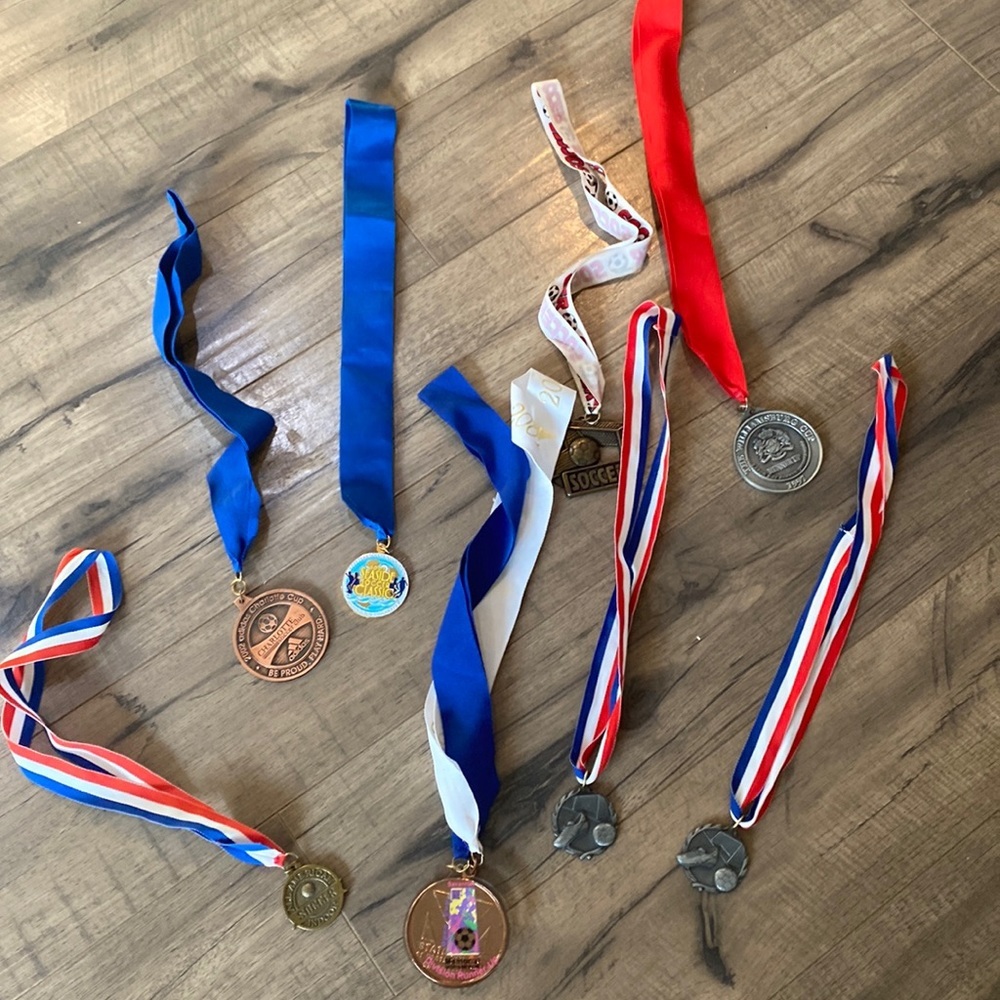 6 medals and 2 free pin